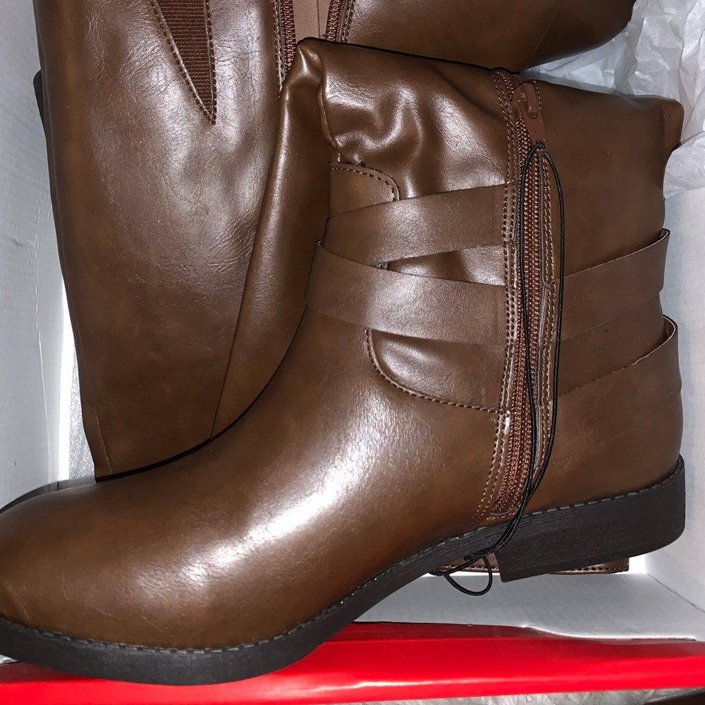 High brown leather boots.
